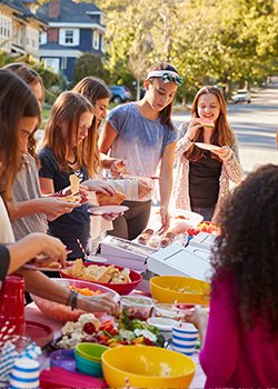 Family and neighbours at a street party