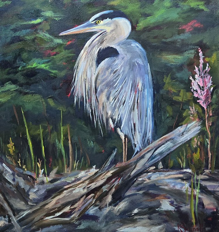 A painting of a Blue Heron standing on a fallen tree branch in a natural setting. The heron has long, elegant feathers and is depicted with its head turned to the side. The background features lush greenery and some pink flowers, creating a serene and picturesque scene.