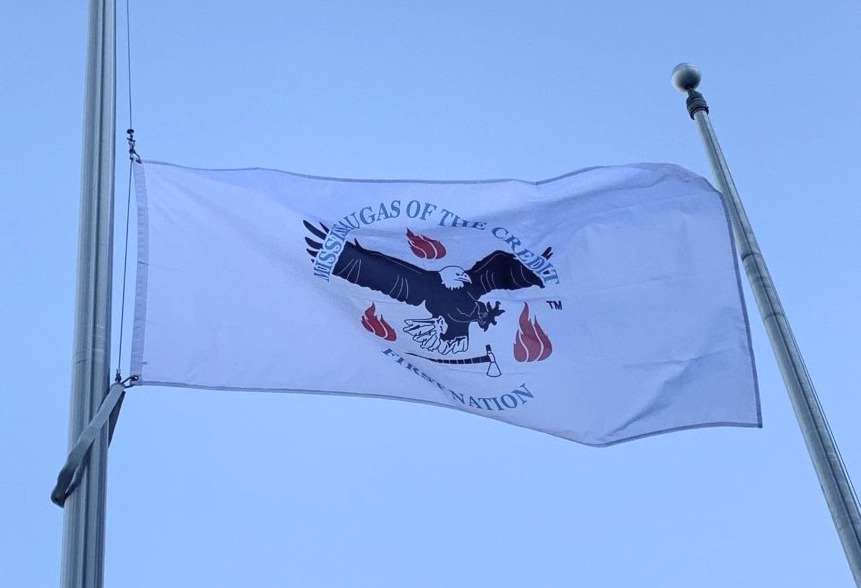 The MCFN flag raised on a flagpoll