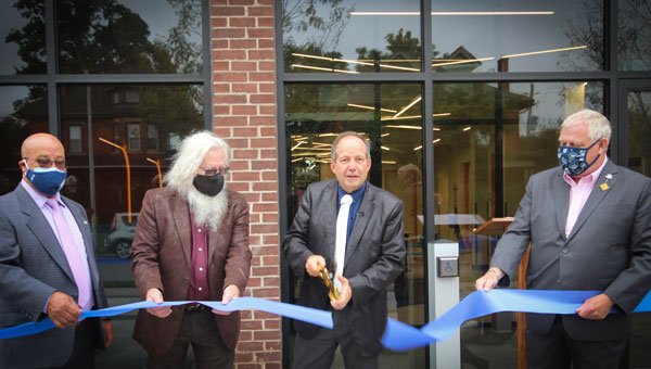 Mayor and council cutting ribbon at Acton Youth Centre