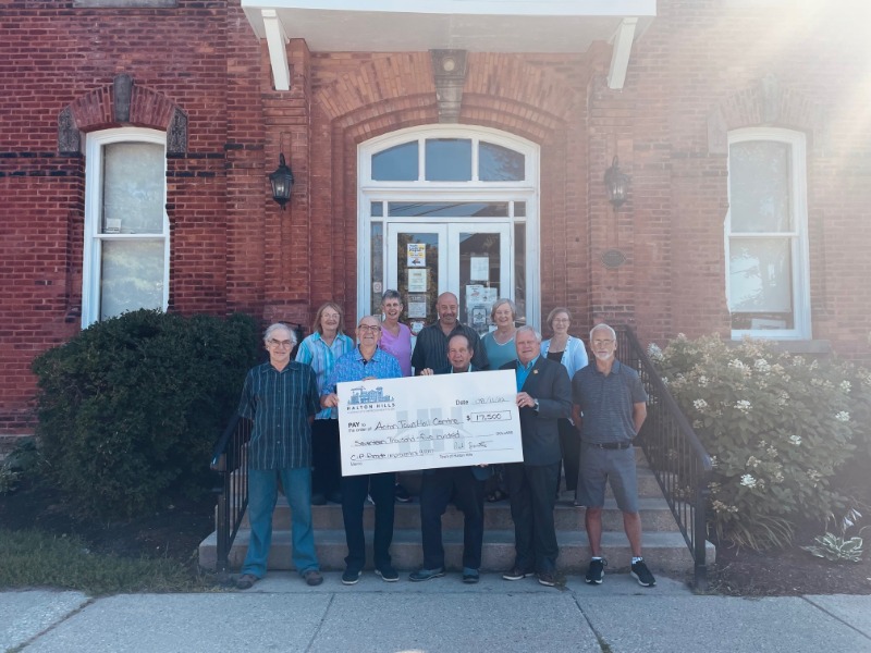 Acton Heritage received cheque for Facade Improvement Grant outside Acton Town Hall