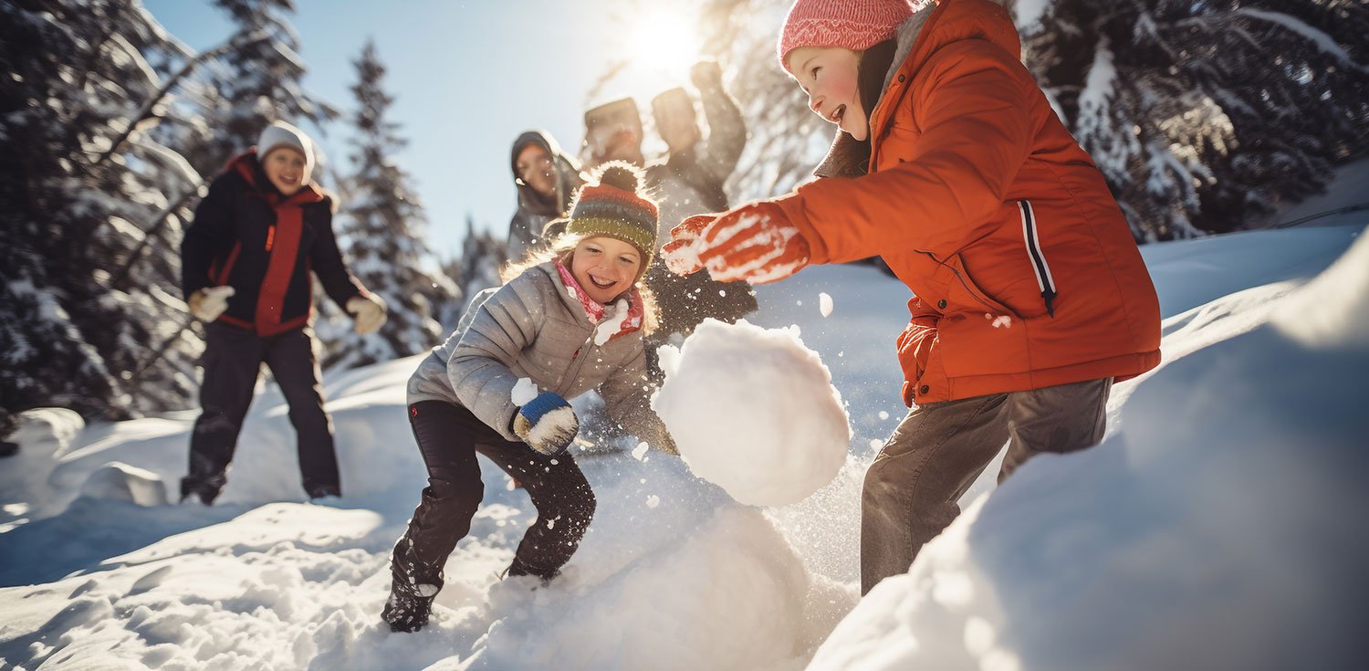 Family playing in the snow