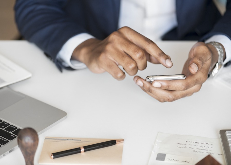 Person typing on laptop computer